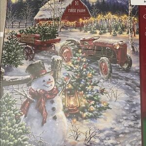 Charming Holiday Snowman Scene with Red Tractor